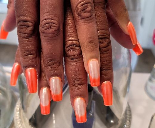 Warm orange ombre nails by J.S. Nail Spa