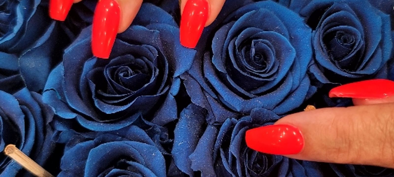 A finished red gel manicure by J.S. Nail Spa