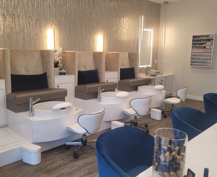 The bright, minimal interior of J.S. Nail Spa in Whitefish Bay
